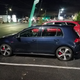 Parked next to my GTI on the night we bought it, photo taken because I was still surprised by the size, even though that is why I bought it.